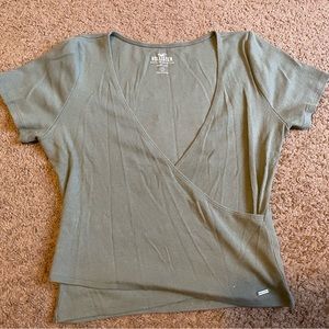 green hollister baby tee